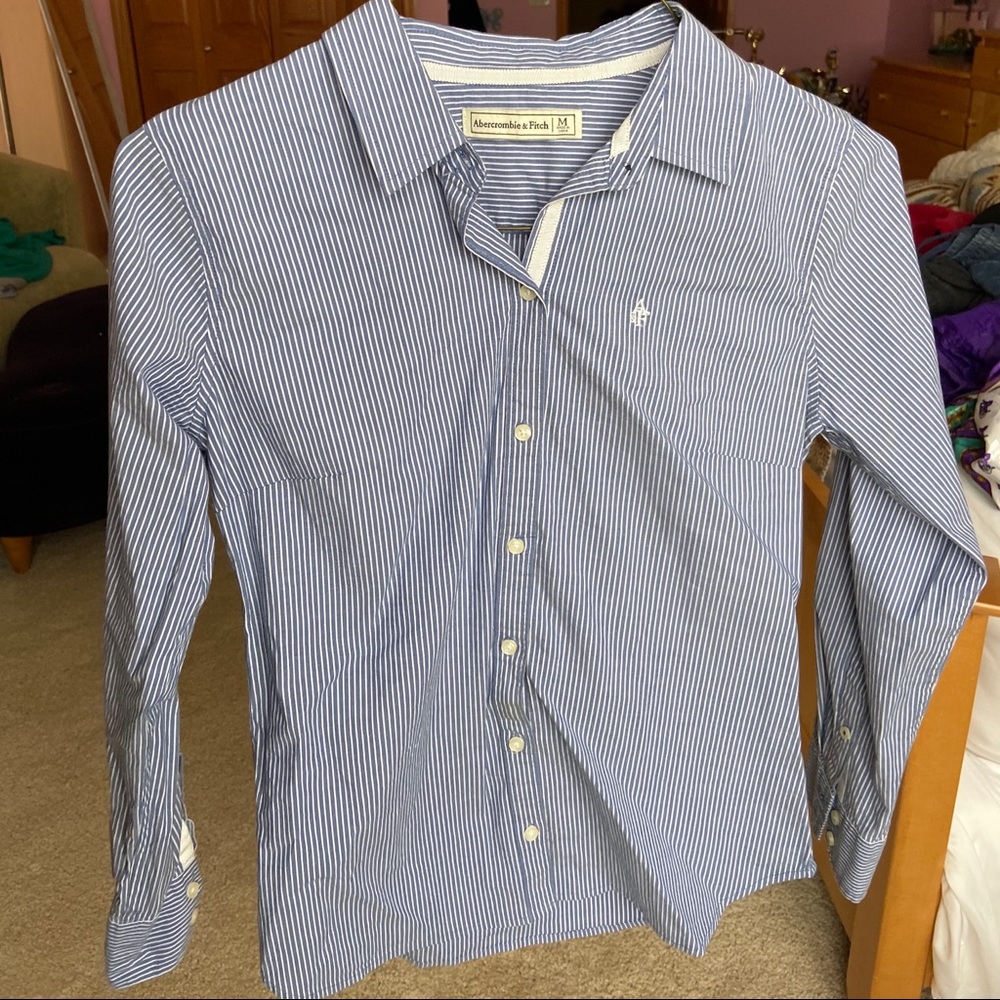 blue and white pinstriped button up shirt